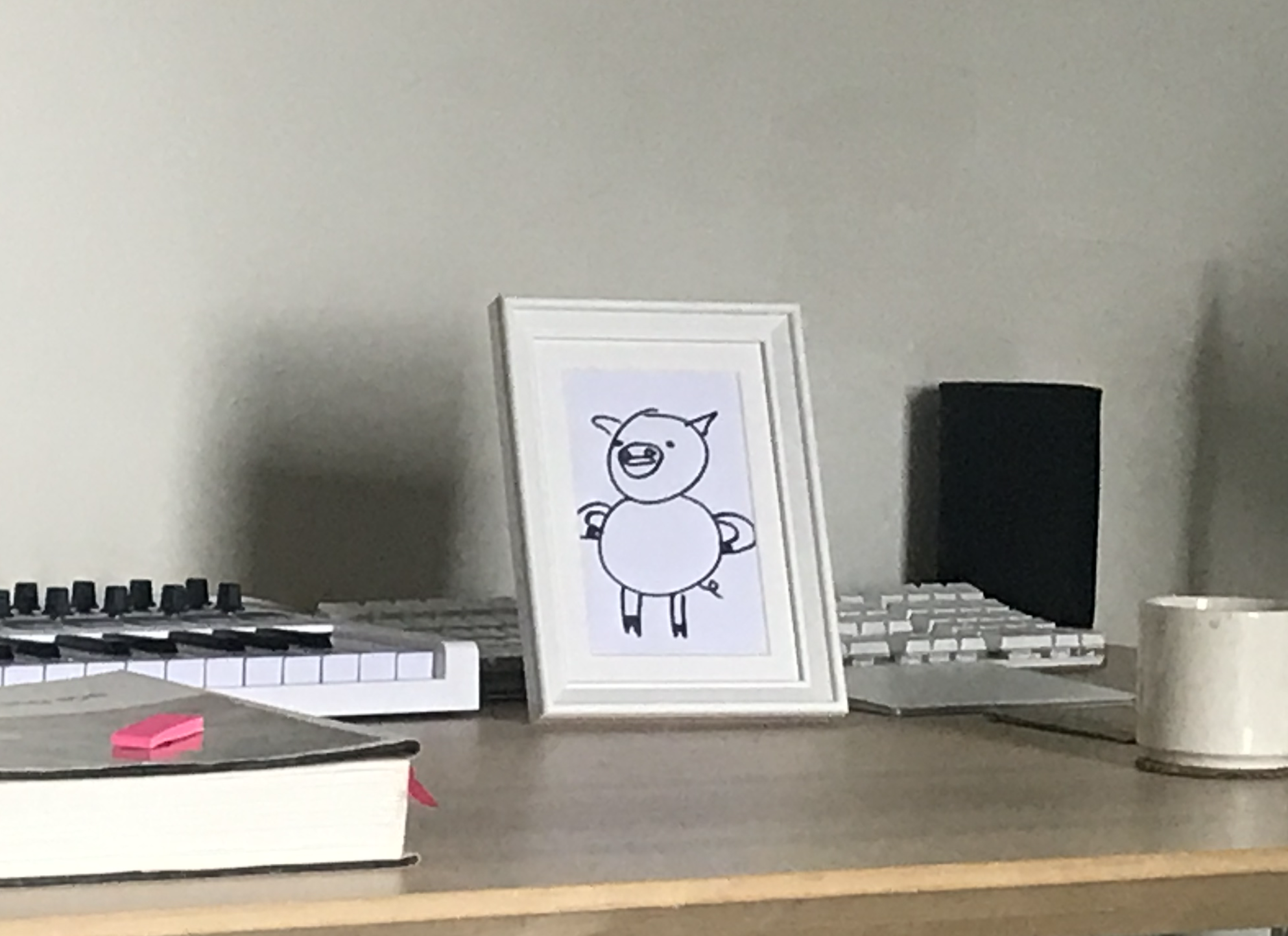 a picture of a pig in a photo frame