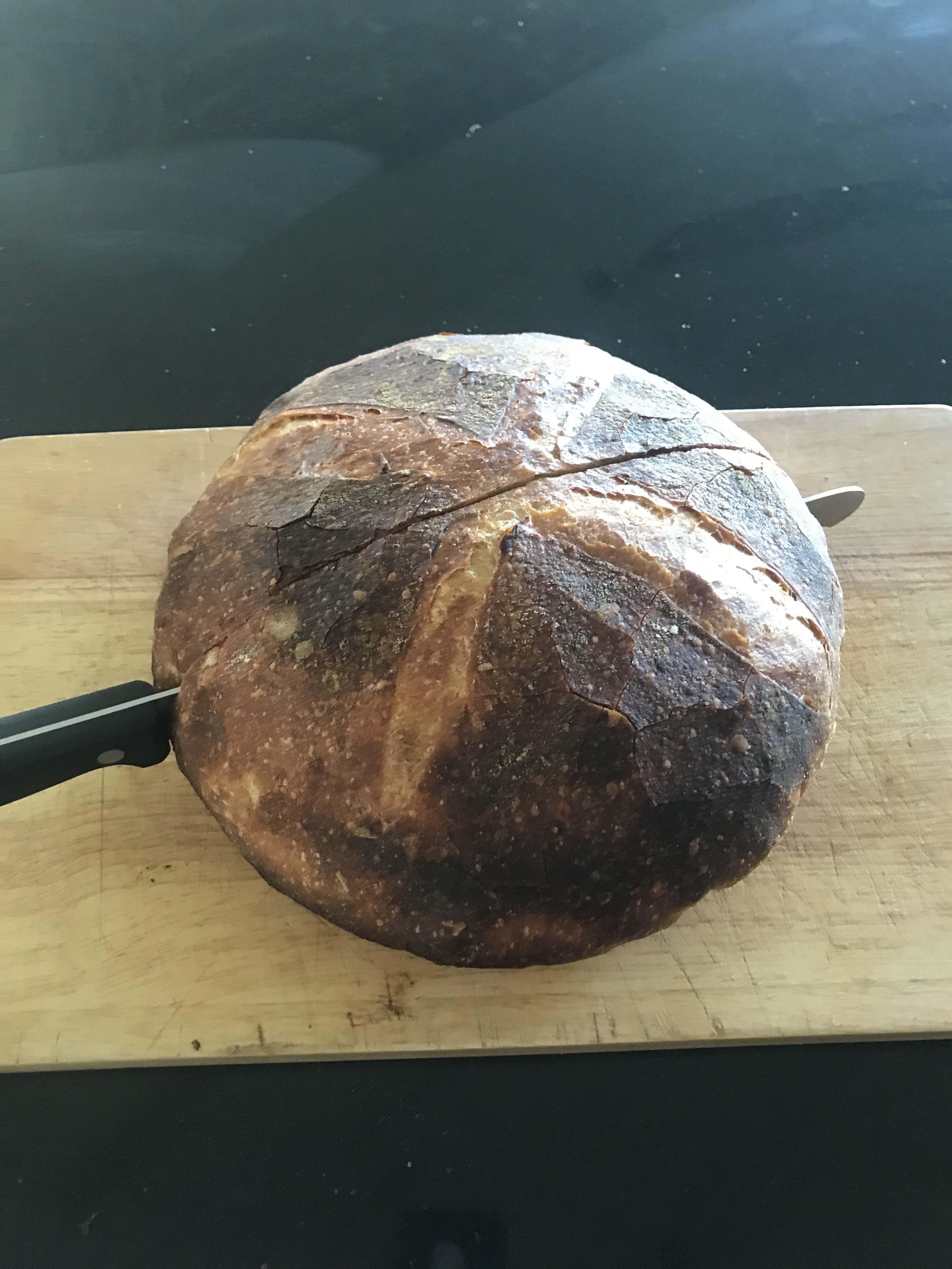 Bread with a knife in it, from above